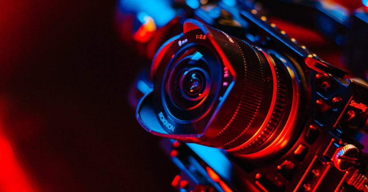 A DSLR camera with vibrant lighting on a photography set.